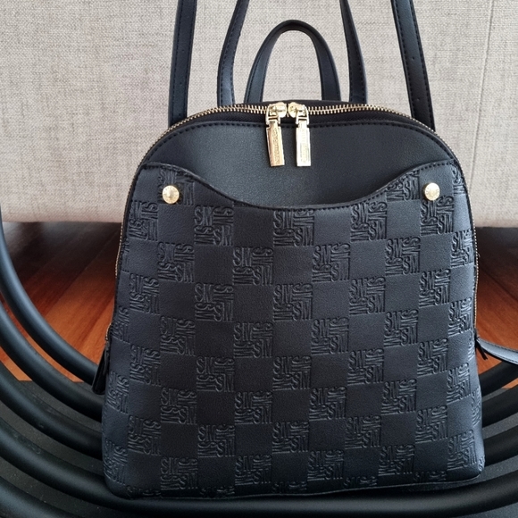 Steve Madden Handbags - ⭐️ SOLD ⭐️NEW STEVE MADDEN black leather bagpack